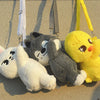 A collection of soft stuffed animal plush dolls featuring characters like Stitch and a yellow creature hanging from a keychai