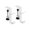 A pair of white foldable aluminum desk hooks designed for hanging bags and coats.