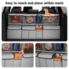 A car trunk organizer showing various items like snacks and tools stored in hanging pockets for easy access.