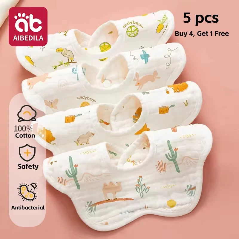 A pack of five white soft cotton muslin bandana bibs for babies with various cute designs
