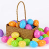A woven basket filled with 100 colorful plastic Easter eggs in various shades of pink, yellow, green, and blue.
