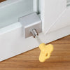 A silver aluminum alloy sliding window lock with a yellow security stopper is shown mounted on a white frame.