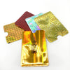 A stack of five RFID-blocking aluminum card holders in various colors and finishes.