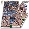 Cotton Satin Grand Wax fabric featuring a brown background with blue and pink glitter floral patterns