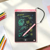 A pink portable LCD drawing tablet displaying green outlines of astronauts and space objects on a white table.