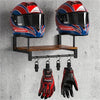 A motorcycle helmet wall mount featuring two helmets and a wooden shelf with hooks for gloves.