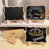 Three mini wooden chalkboard signs featuring illustrations of juice, coffee, and bread.
