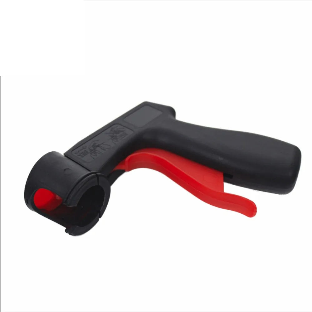 Black and red ergonomic spray paint gun handle for aerosol cans.