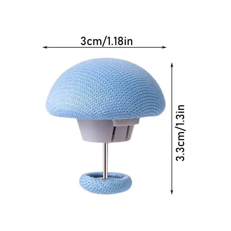 A light blue, mesh-covered duvet cover clip with a silver stand, shown with dimensions.