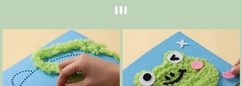 A hand is pressing green felt material onto a blue felt background to create a felt animal craft.