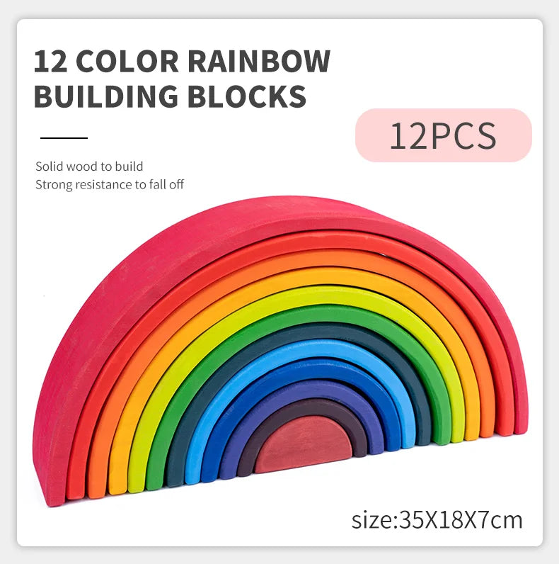 A set of 12 color rainbow building blocks made of solid wood stacked in an arc.