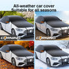 Black all-weather car cover suitable for all seasons protecting a white vehicle's windshield.