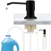 A black stainless steel under-sink soap dispenser with an extension tube pouring liquid into a glass bottle.