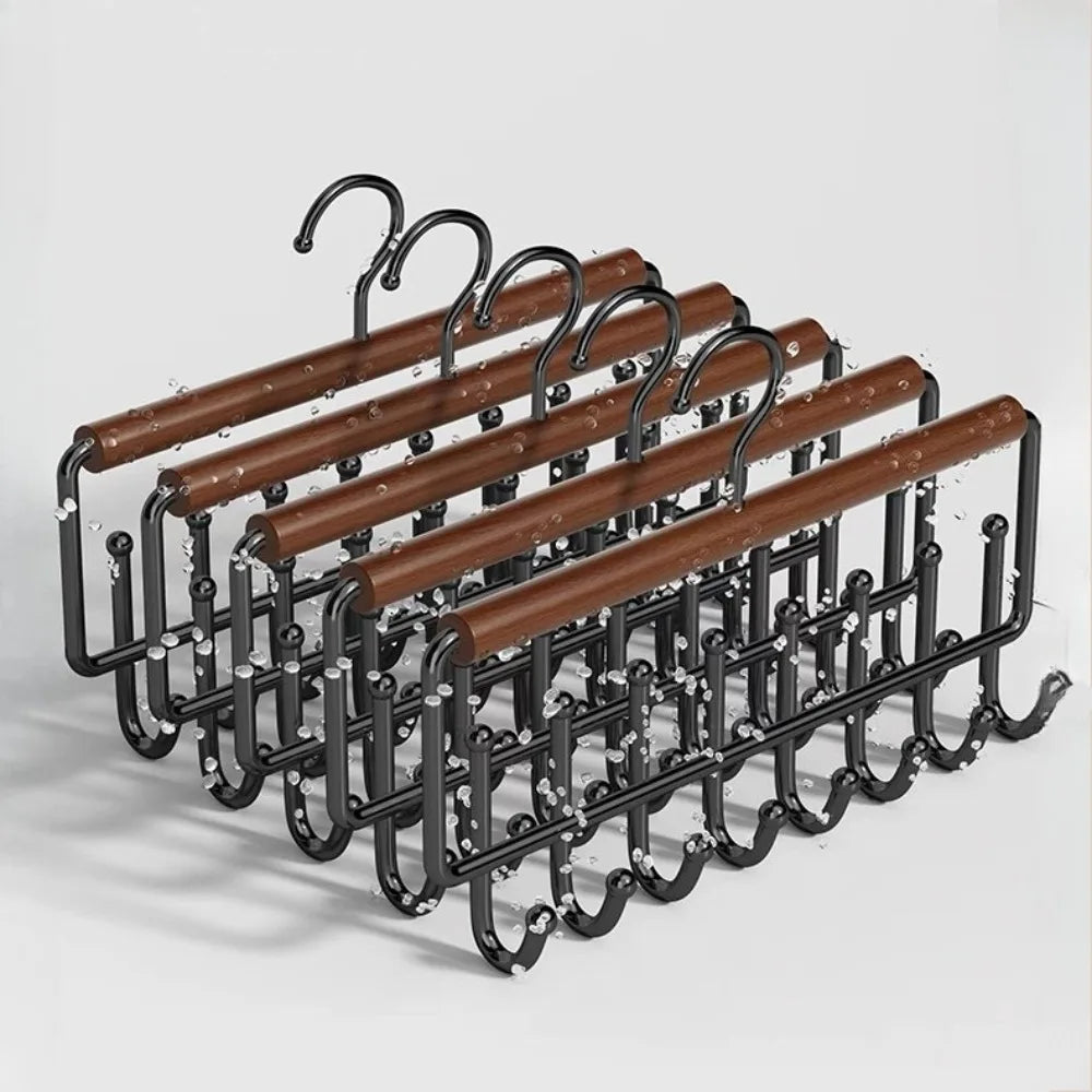 A wall-mounted organizer rack with eight wooden bars and black iron hooks.