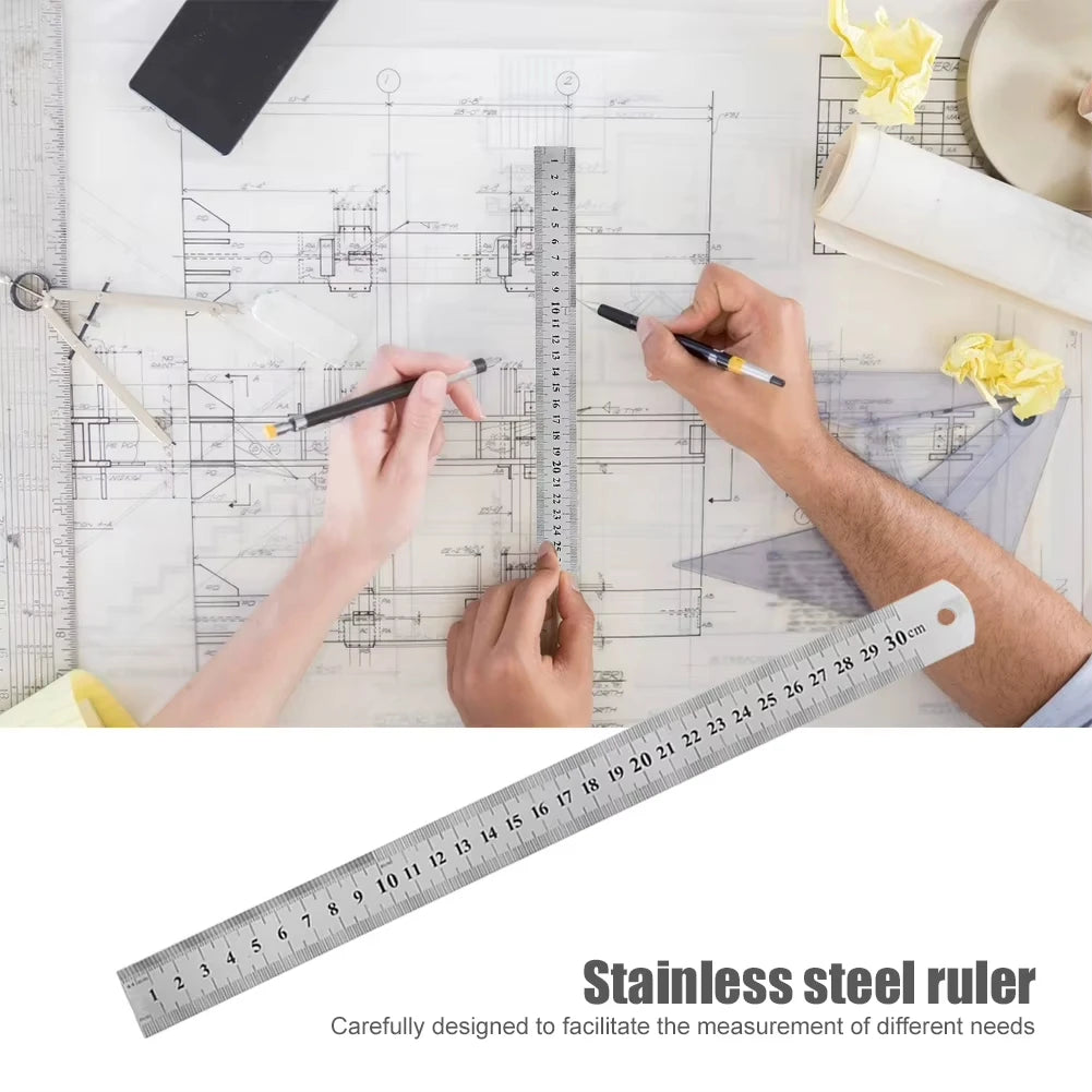 A hand is using a stainless steel ruler to measure on a blueprint or technical drawing.
