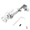 A silver turbo sound whistle fitting for a car exhaust pipe with mounting hardware.