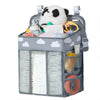 A gray hanging diaper storage organizer holding a panda toy and various diapers and accessories.