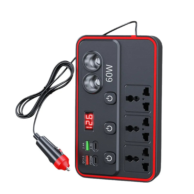 A black portable car power inverter with a red border showing a digital display and multiple AC and USB outlets.