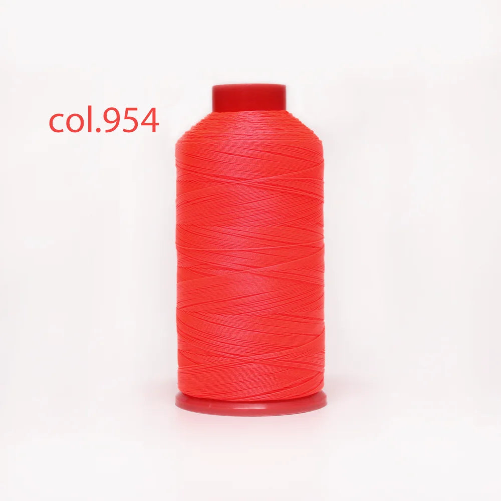 A spool of bright red heavy-duty nylon bonded thread labeled col.954.
