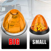Comparison of a big and small waterproof LED side marker light for vehicles.