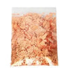 A close-up view of metallic foil flakes used for crafting, nail art, and resin projects.