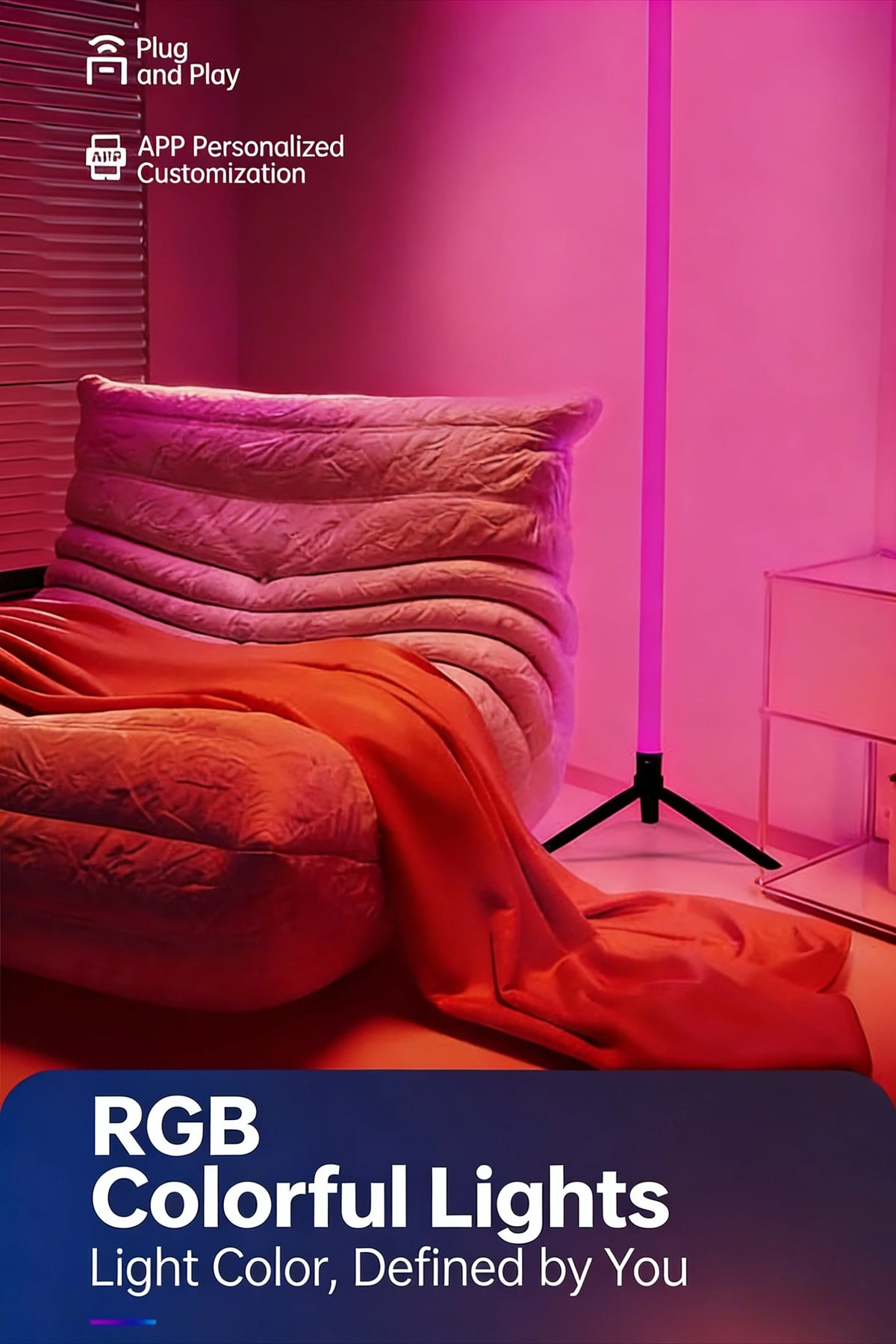 A pink room features an orange fabric draped over a sofa, illuminated by a vertical purple LED light.