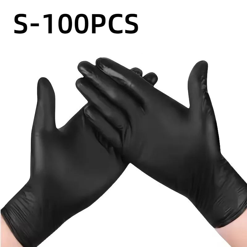 A pair of black disposable nitrile gloves shown in a close-up view.