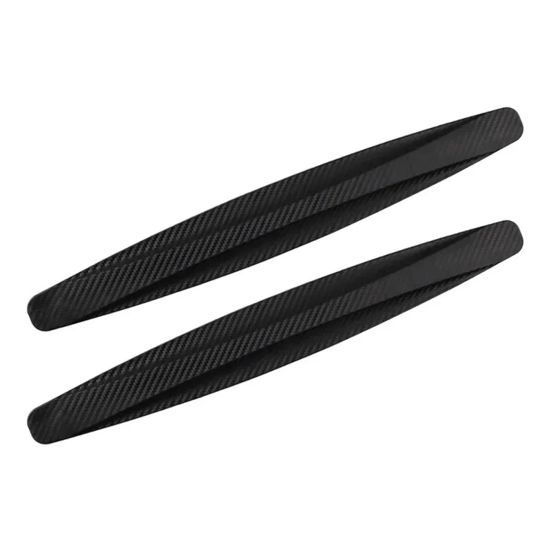 A set of two black car bumper protector strips or anti-collision corner guards.