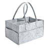 A gray portable canvas diaper storage organizer with handles is shown from above.