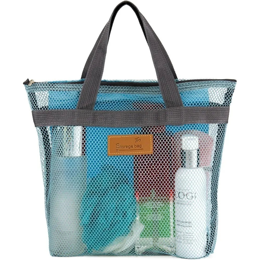 A mesh hanging toiletry bag with a gray fabric handle filled with various personal care products.