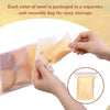Hands are packaging a piece of yellow wool roving into a clear, resealable bag for storage.
