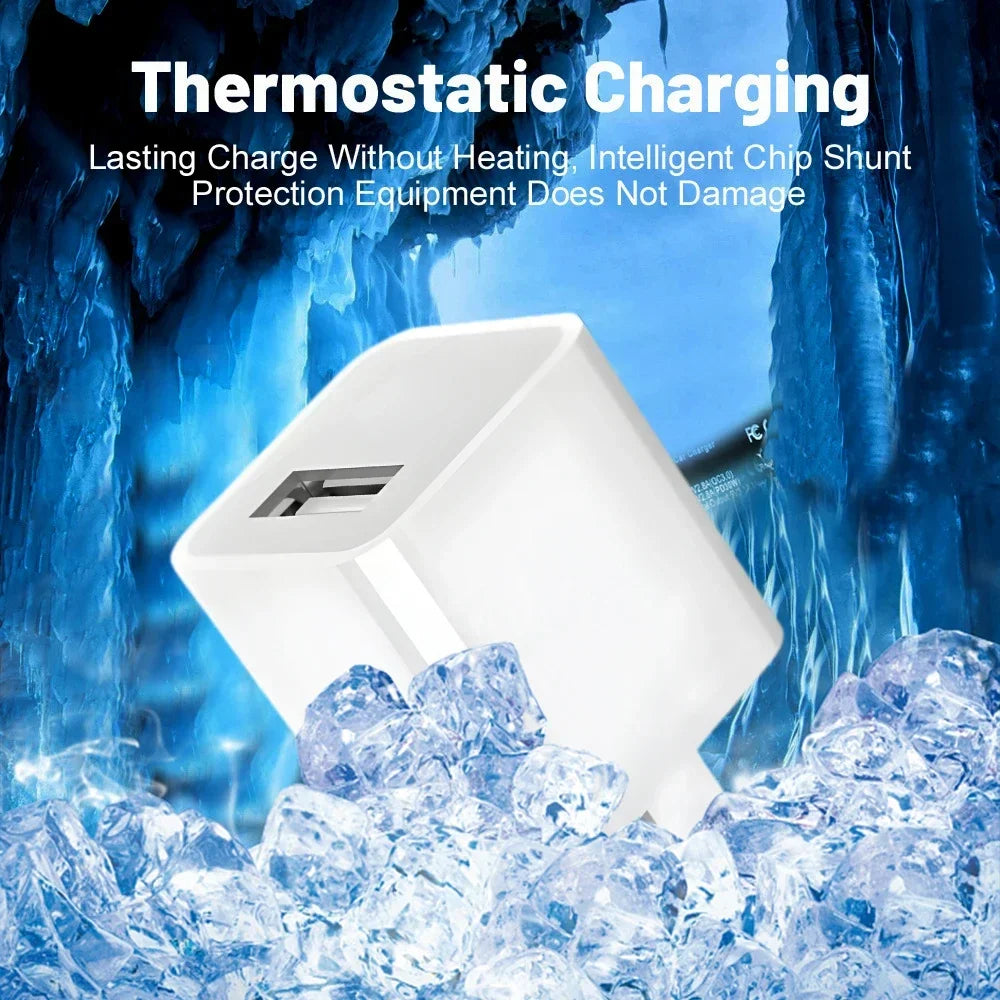 A white thermoelectric charging device is shown resting on a pile of ice cubes against a blue, icy background.