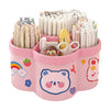 A pink rotating desk organizer holding numerous pens, pencils, and writing supplies.