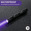 A purple UV flashlight is shown against a wet, dark surface, demonstrating its waterproof capability.