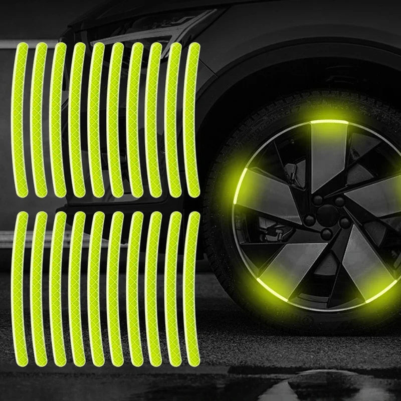 Bright yellow reflective strips installed on a car wheel rim.