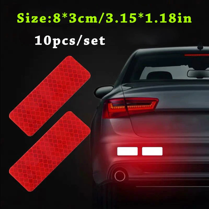 Ten reflective red car safety strips for night and low-light visibility shown on a dark car body.