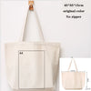 A natural canvas tote bag with a handle and an A4 sized rectangular section shown against a white background.