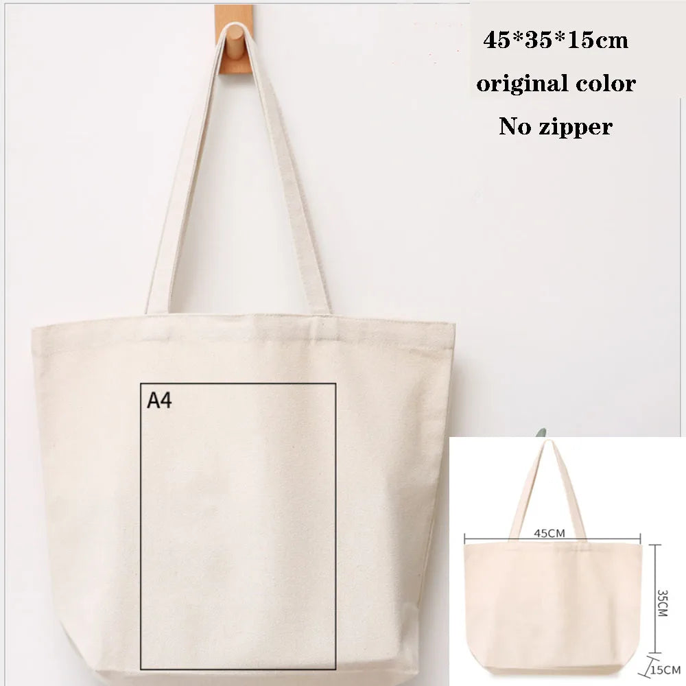 A natural canvas tote bag with a handle and an A4 sized rectangular section shown against a white background.
