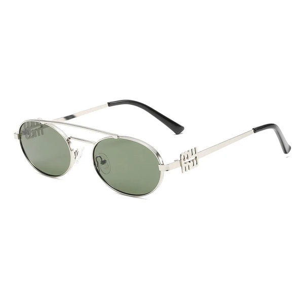 Un par de gafas ovaladas de doble puente verde oliva con monturas de metal plateado.