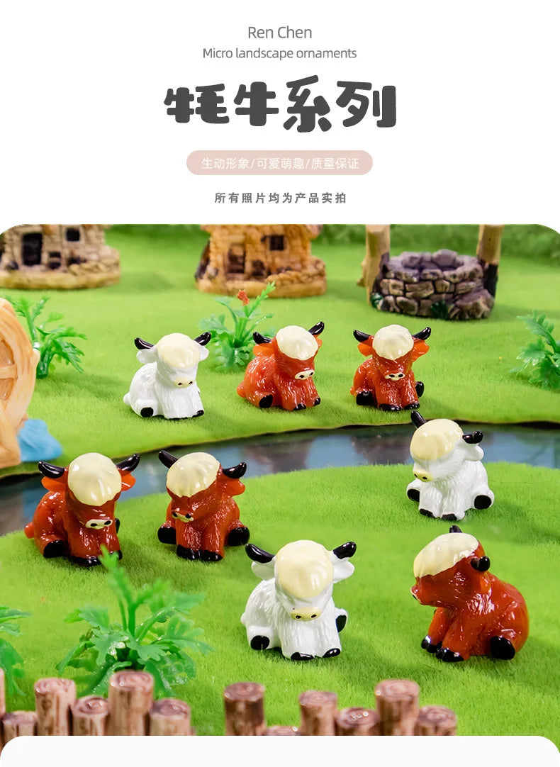 A collection of colorful resin highland cow figurines in various poses displayed on a green landscape background.