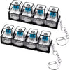 A set of LED macaron keyboard fidget toys packaged in a clear plastic case with attached chains.