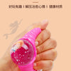 A hand is squeezing a pink, translucent ball with glitter inside, demonstrating a stress relief fidget toy.