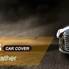 A black Audi car is shown with a factory sales tag and a car cover in the foreground.
