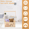 A wooden baby storage box with a handle featuring a rainbow pattern, displayed in a nursery setting.