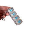 Clear plastic light-up keyboard keychain fidget toy attached to a silver chain