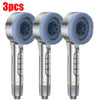 Three handheld shower heads with silicone nozzles and metal bodies are shown side by side.