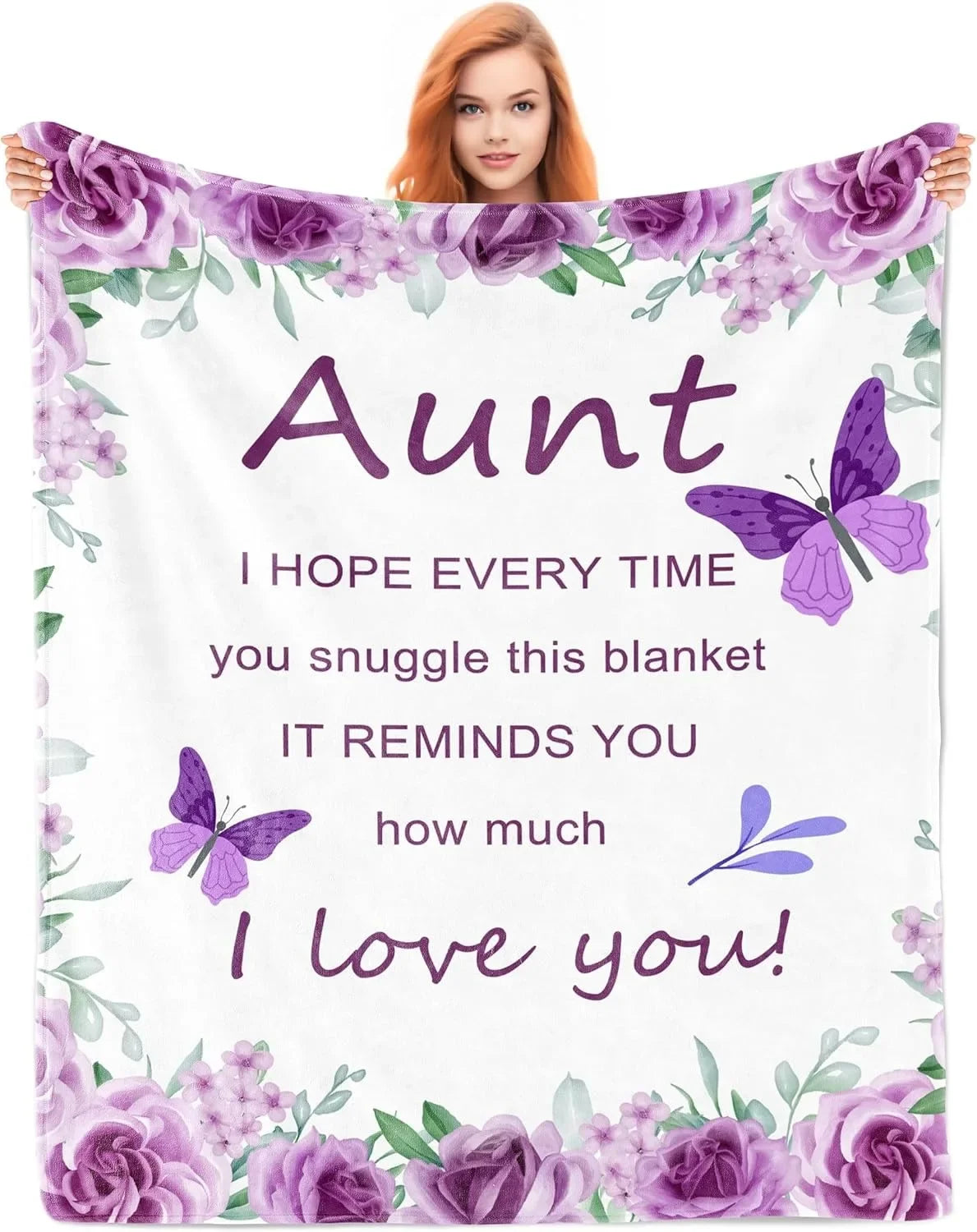A purple floral fleece blanket featuring a butterfly design and the text I hope every time you snuggle this blanket it remind