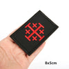 Black embroidered patch featuring a red Knights Templar cross design with hook and loop backing