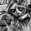 A black and white artistic rendering of a sugar skull face with floral accents on a draped fabric.