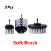 A set of three soft brush attachments for a power drill, featuring black and white bristles.